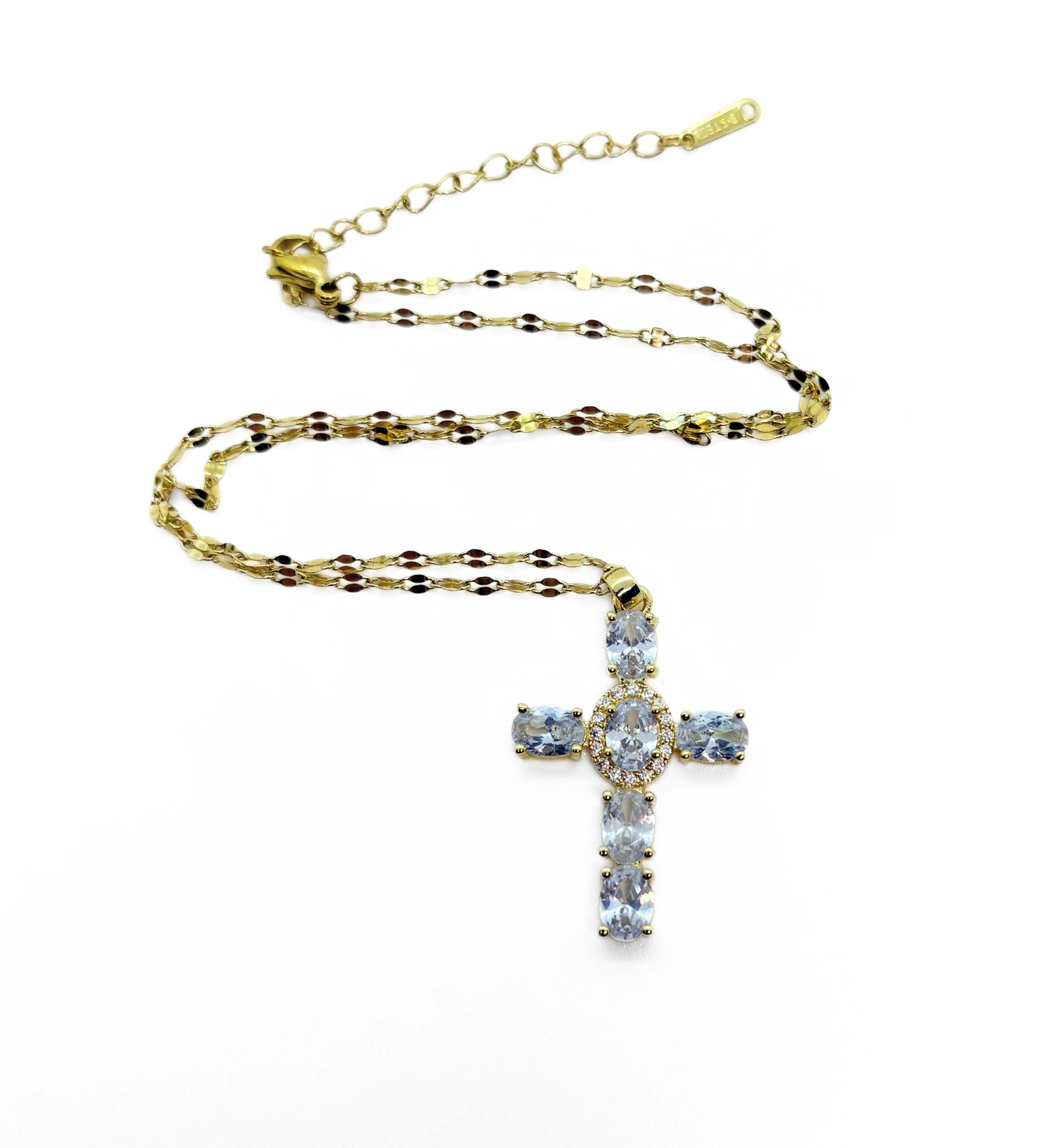 Collier avec croix dorée et cristal blanc
